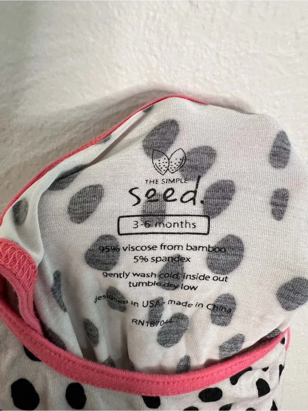 The Simple Seed Polka Dot Baby Romper in Cream and Pink size 3-6 months